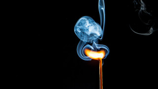 Matchstick lit smoke black background - a matchstick free wallpaper