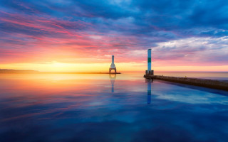 Sunset water tower clouds boat - impressionist free wallpaper