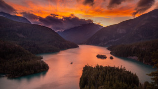 Lake mountains sunset boat cloudy - the water and a boat free wallpaper