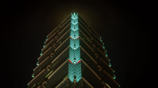 Tall clocktower night green light - modern art deco free wallpaper