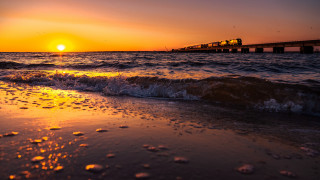 Train bridge ocean sunset waves - sunrise time free wallpaper