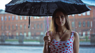 Woman umbrella rain building city - a building in the background free wallpaper