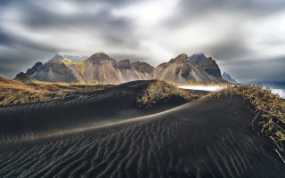 Mountain range water sand dune - a body of water free wallpaper