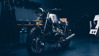 Motorcycle dark room table sign - a chair in the background free wallpaper