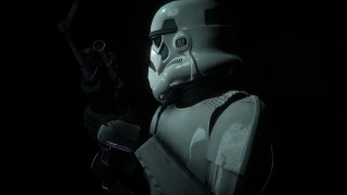 Star wars robot helmet gun - a star wars character holding free wallpaper