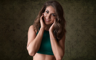 Woman green top posing face - alison geissler free wallpaper