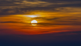Sunset plane clouds ocean horizon - a sunset free wallpaper