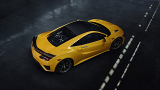 Yellow sports car black floor - side profile free wallpaper