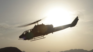 Helicopter sun mountains person boat - a helicopter free wallpaper