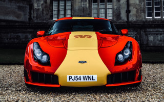Red yellow sports car building - david ramsay hay free wallpaper