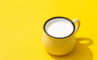 Yellow cup white substance shadow - a yellow background free wallpaper for desktop