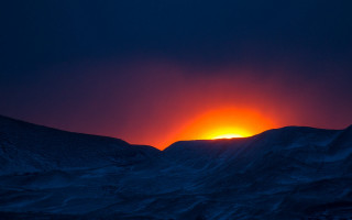Sunset mountains orange sun clouds - a sunset over a mountain range free wallpaper