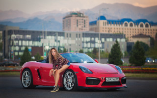 Woman red sports car cityscape 2 - neoism free wallpaper