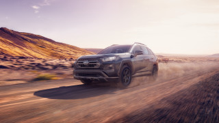 Silver toyota rav dirt road - a dirt road in the desert free wallpaper