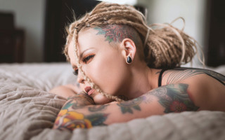 Tattooed woman bed blonde blurry - carey morris free wallpaper