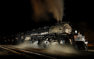 Train night smoke tracks person - long exposure free wallpaper
