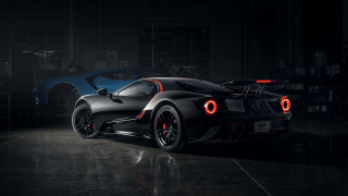 Black sports car dark garage 2 - a dark garage free wallpaper
