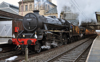 Train coming tracks building station - colin gill free wallpaper