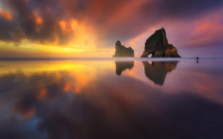 Beach rock formation sunset mountain - mystical free wallpaper