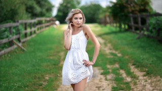 Woman white dress cell phone 3 - a dirt road free wallpaper