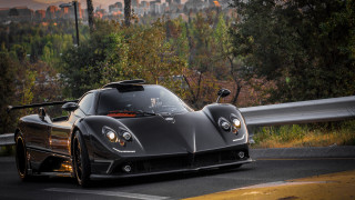 Black sports car forest city - luxury free wallpaper
