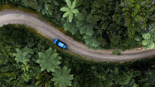 Blue car forest dirt road - both side free wallpaper