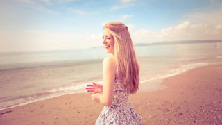 Woman beach ocean frisbee sky - a frisbee free wallpaper