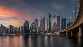 City skyline bridge water sunset - sky free wallpaper