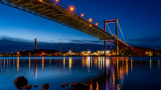 Bridge cityscape night lights reflection - a sky line free wallpaper