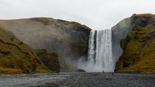 Waterfall person cliff mountains scenery - bernt tunold free wallpaper