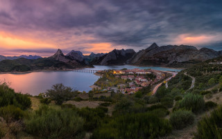 Scenic town lake mountains bridge - the background and a bridge in the foreground free wallpaper