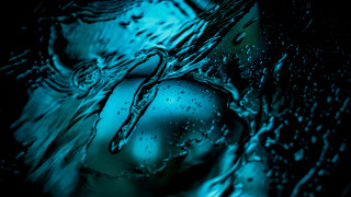 Blue water droplets face abstract - background free wallpaper for desktop