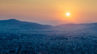 City skyline sunset mountains birdseye - a sunset in the background and mountains free wallpaper
