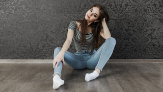 Woman sitting crossed legs head - full body pose free wallpaper