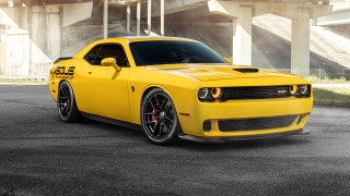 Yellow sports car bridge building - a bridge and a building free wallpaper