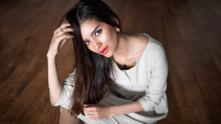Woman long hair portrait posing - a wooden floor free wallpaper