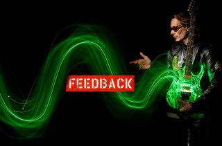 Man holding guitar pointing feedback - interactive art free wallpaper