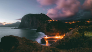 Mountain lake city lights night - scenic free wallpaper