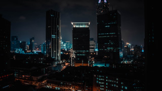 City skyline night clock tower - a few building free wallpaper