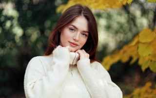 Woman white sweater autumn leaves 2 - yellow leaf free wallpaper
