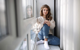 Woman sitting window crossed legs - the floor next free wallpaper