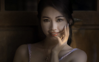 Woman necklace portrait blackhair browneyes - a necklace free wallpaper