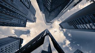 Cityscape tall buildings cloudy day - blue sky free wallpaper