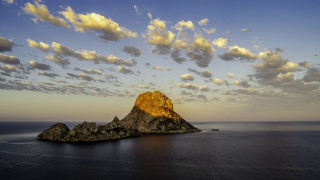 Rock formation ocean clouds sky - magic realism free wallpaper for desktop