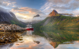 Docked boat mountains lake sunset - calm free wallpaper