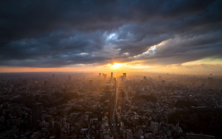 Skyline sunset mountains clouds cityscape - crepuscular ray free wallpaper