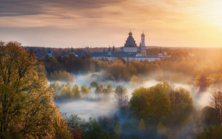 Foggy landscape church trees sunset - artur tarnowski free wallpaper