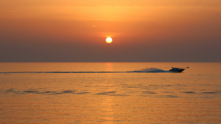 Boat sunset ocean cloud horizon - the distance behind free wallpaper