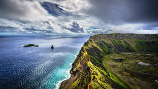 Large water rocky cliff island - a small island in the middle of it free wallpaper