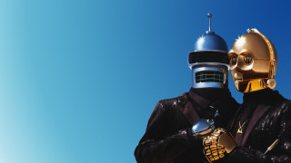 Two people costumes blue sky - a blue sky behind them free wallpaper